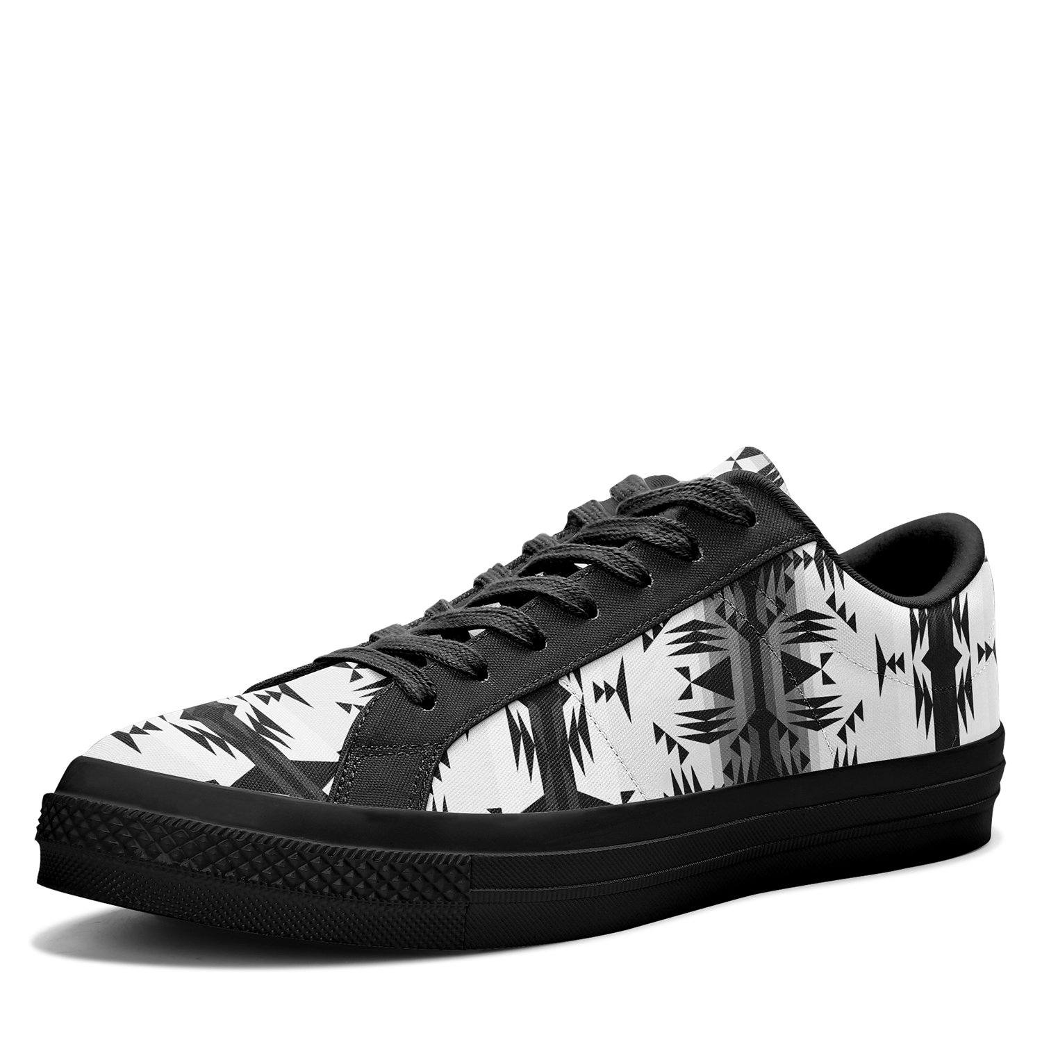 Between the Mountains White and Black Aapisi Low Top Canvas Shoes Black Sole 49 Dzine